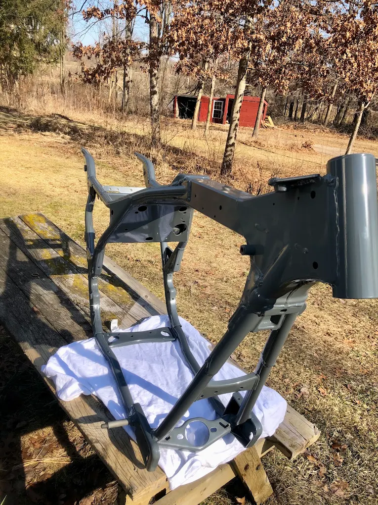 Restored motorcycle frame powder coated gunmetal grey for a Ithaca, MI customer